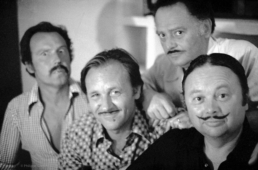 After a dinner, comic-strips authors Tibet, Albert Uderzo, René Goscinny and Jean Graton burnt a cork and draw themselves moustaches. Roquebrune-sur-Argens, France, 1976. Photo © Philippe Graton.