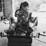 Arthur and the handcrafted racing kart, Pégairolles, France 2003.