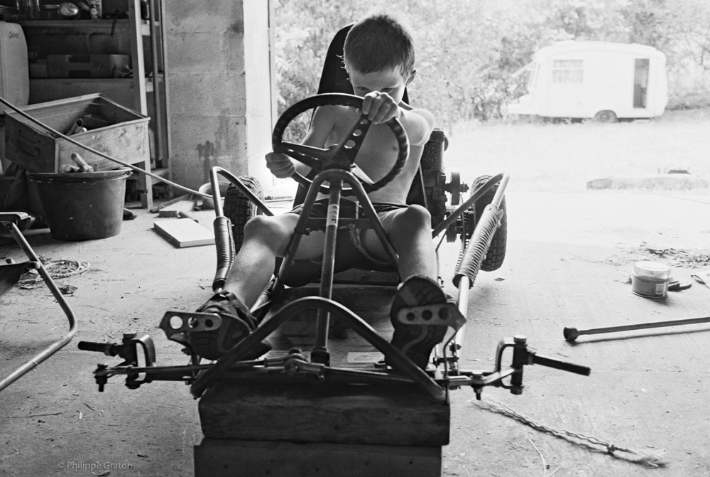 Arthur and the handcrafted racing kart, Pégairolles, France 2003.
